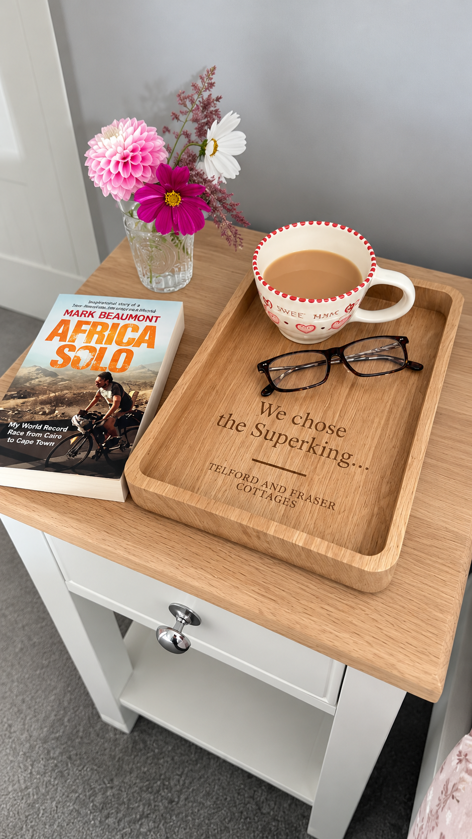 Personalised oak bedside organiser tray with engraved wording, flowers, tea and glasses
