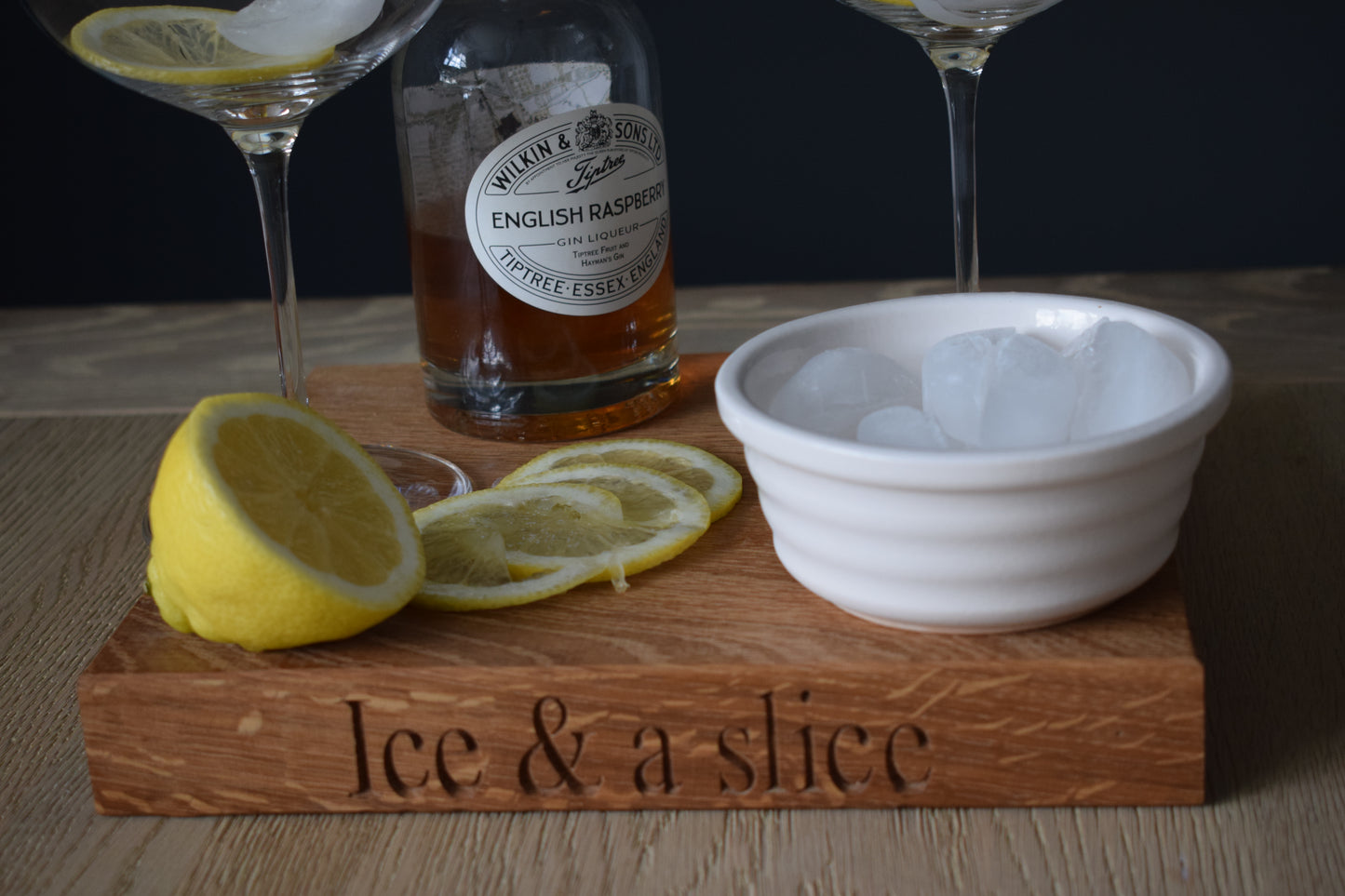 Personalised oak Gin and tonic board Showing glasses and ice and a slice