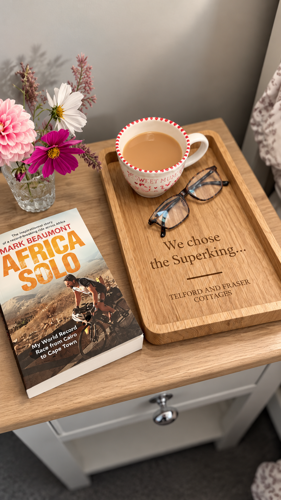 Handcrafted oak bedside tray with personalised engraving, morning tea and book