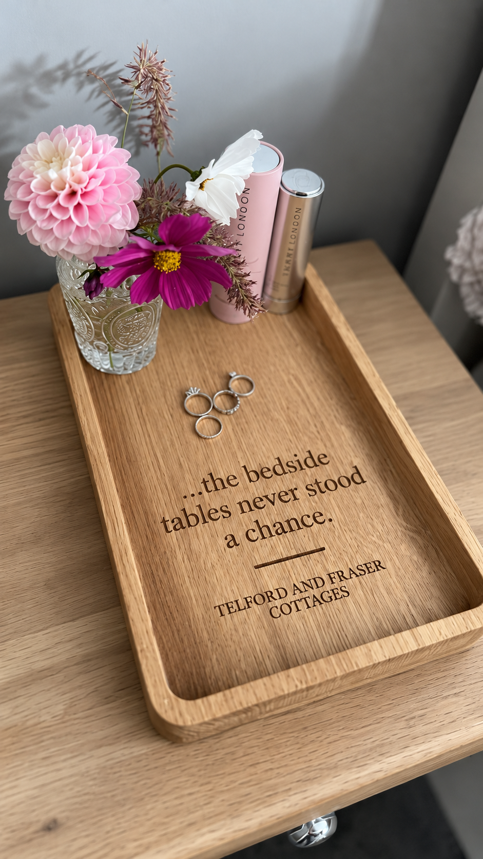 Personalised solid oak bedside tray with engraved wording, flowers and bedside essentials