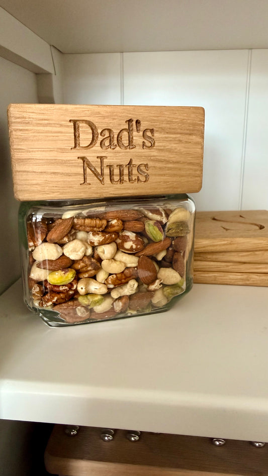 Personalised “Dad’s Nuts” glass snack jar with engraved solid oak lid, handmade Father’s Day gift for dads.